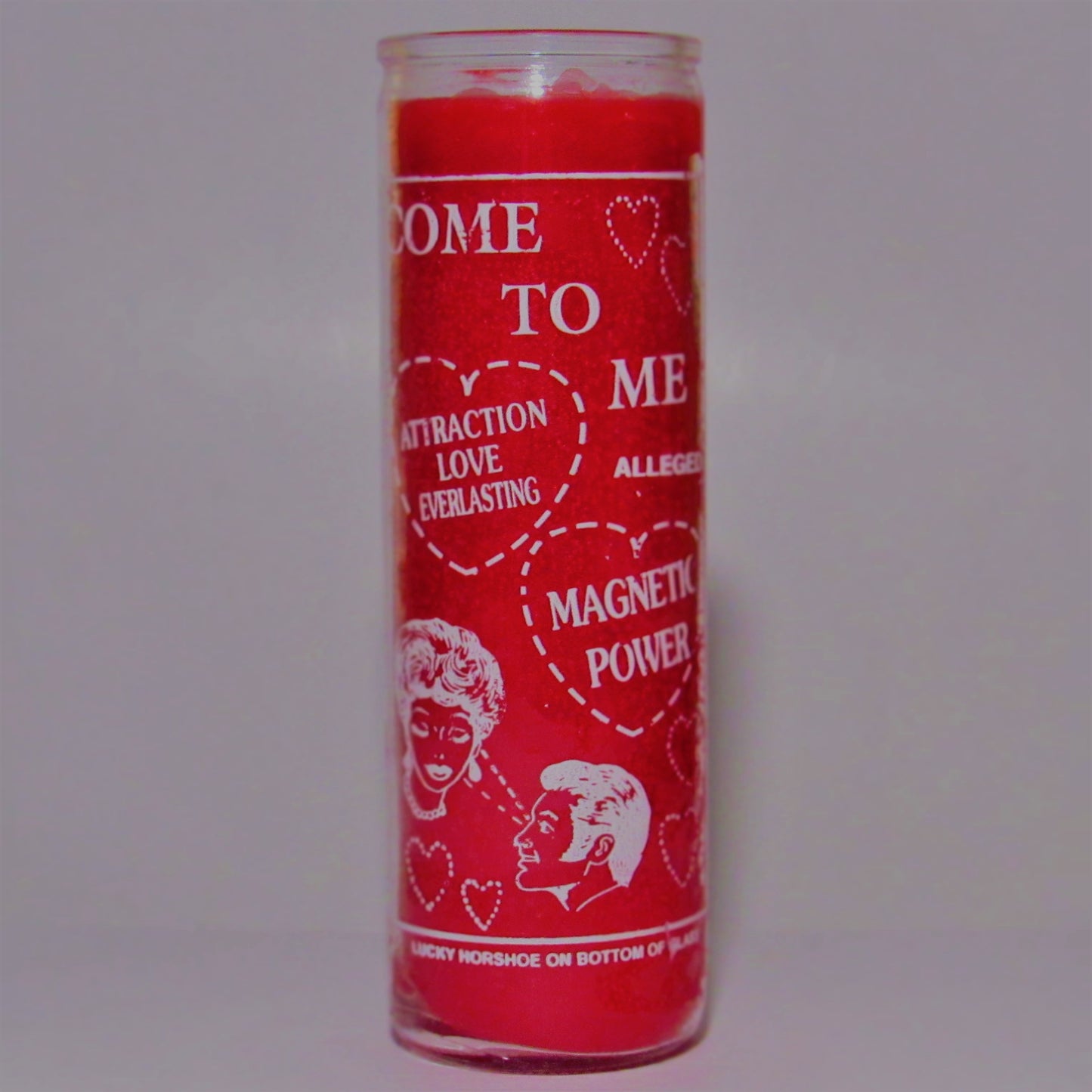 Red candle with white text and graphics