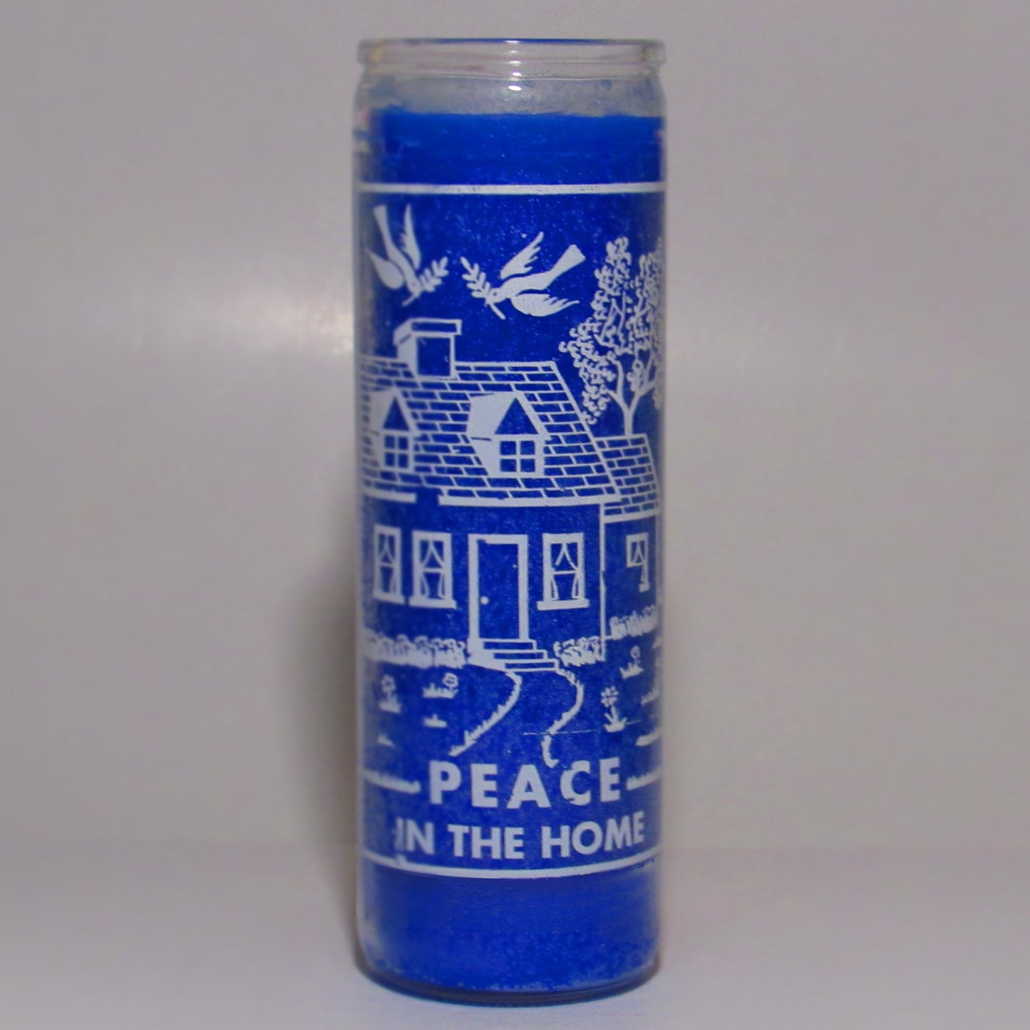 Blue candle with white designs and text