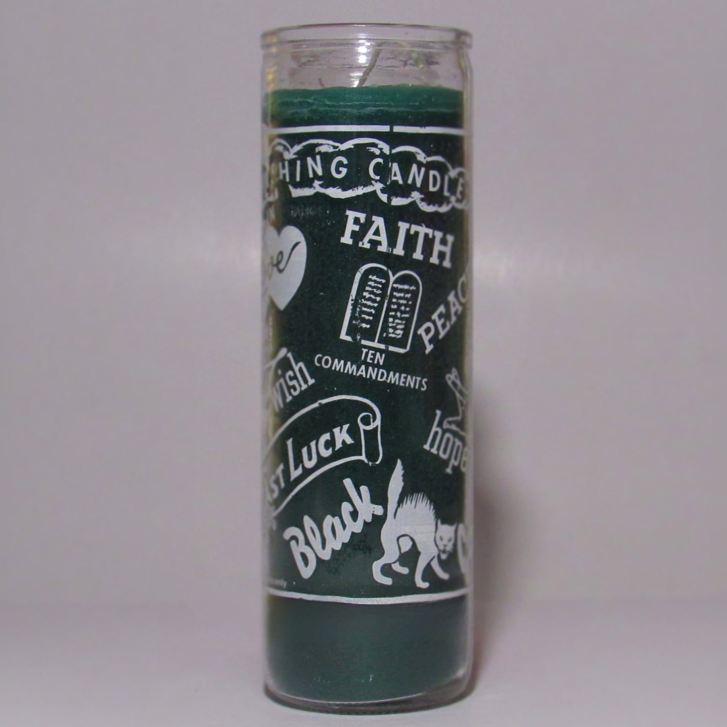 Green candle with white text and graphics