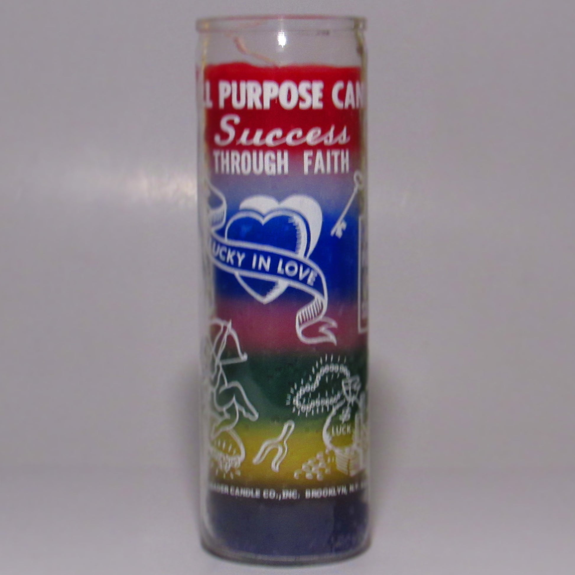 Decorative candle with text and symbols 