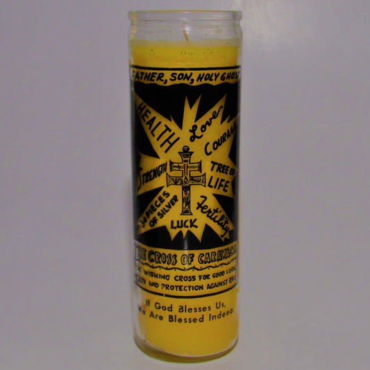 Yellow candle with black text and symbols