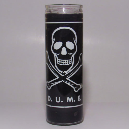 Black candle with a skull and crossbones design and 'D. U. M. E.' text 