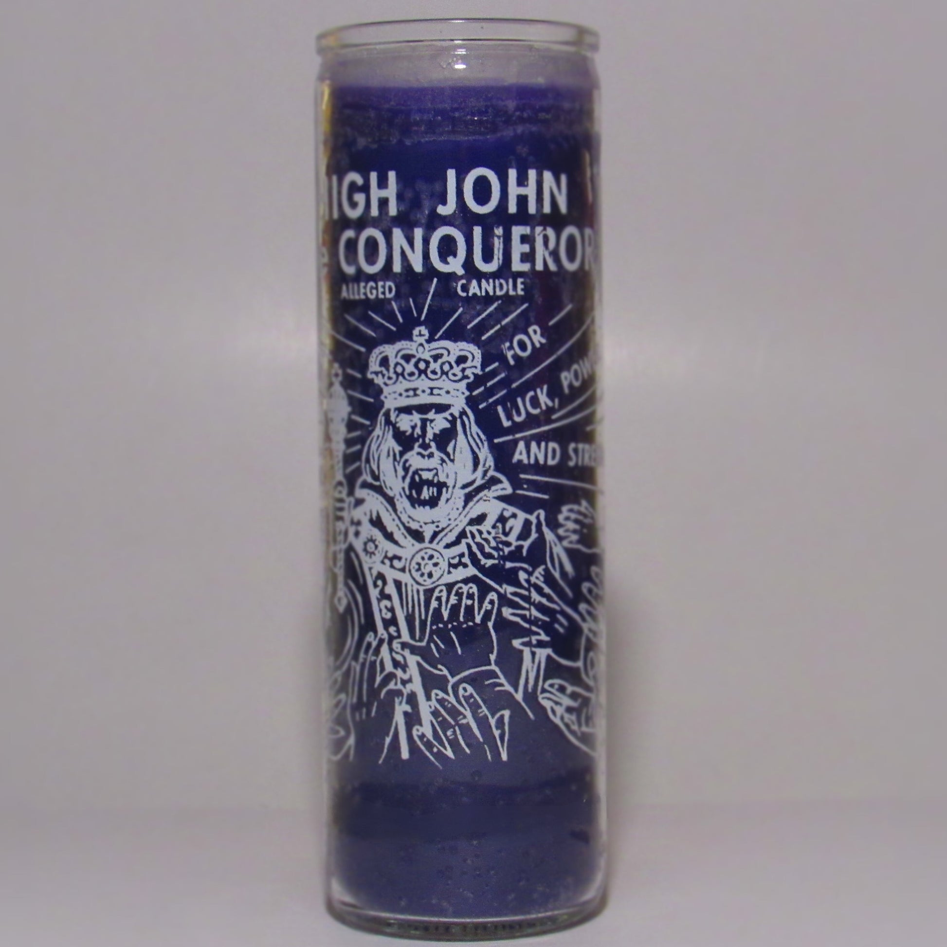 Purple candle with text and illustration in a glass container 