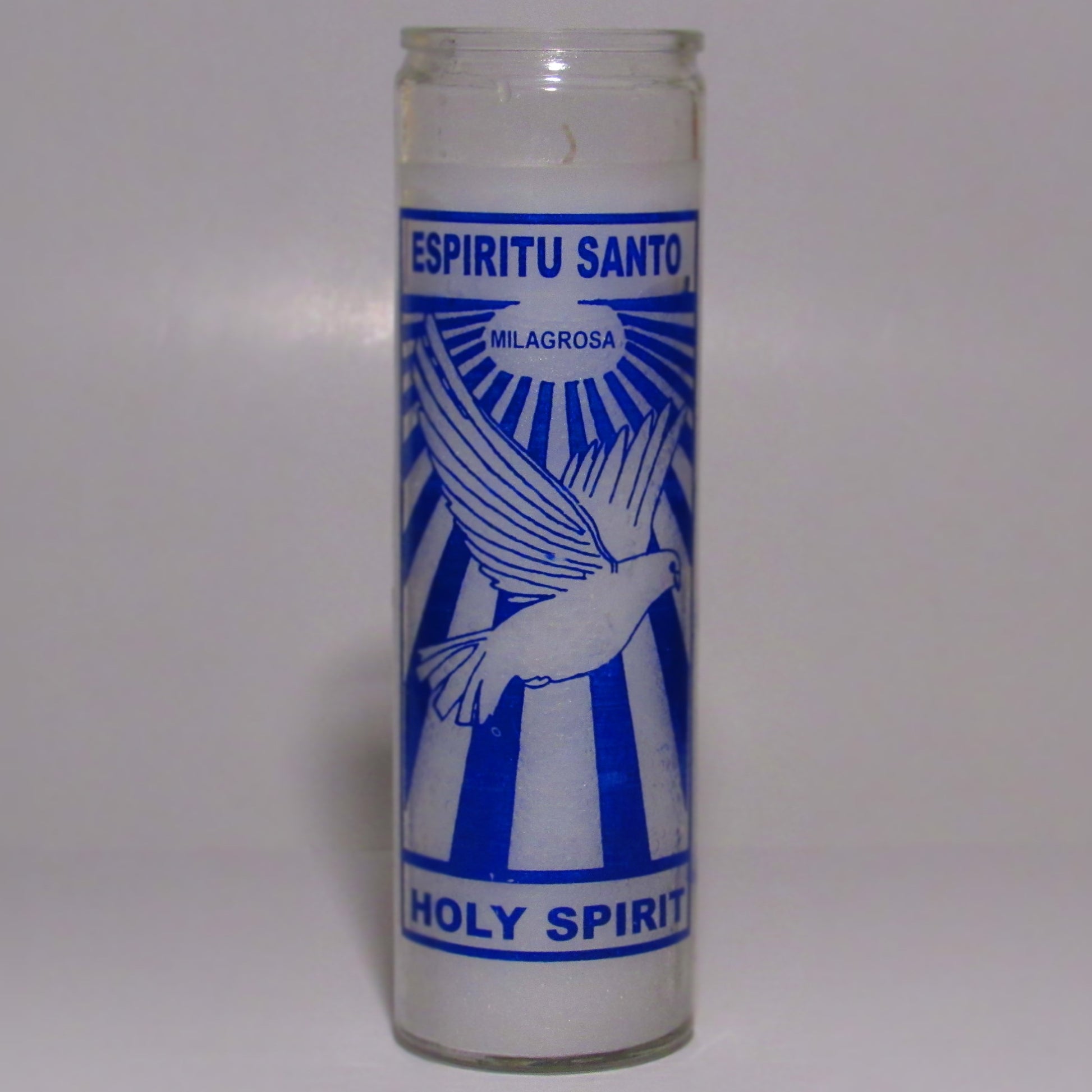 Candle with blue and white design and text 