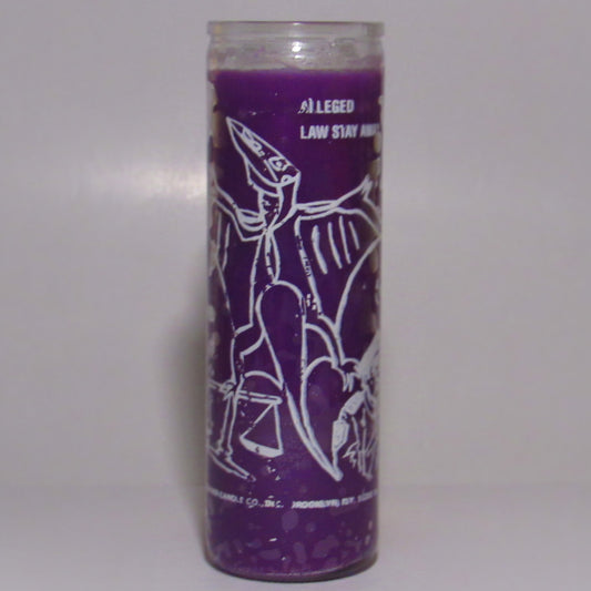 Purple candle with white graphics and text 