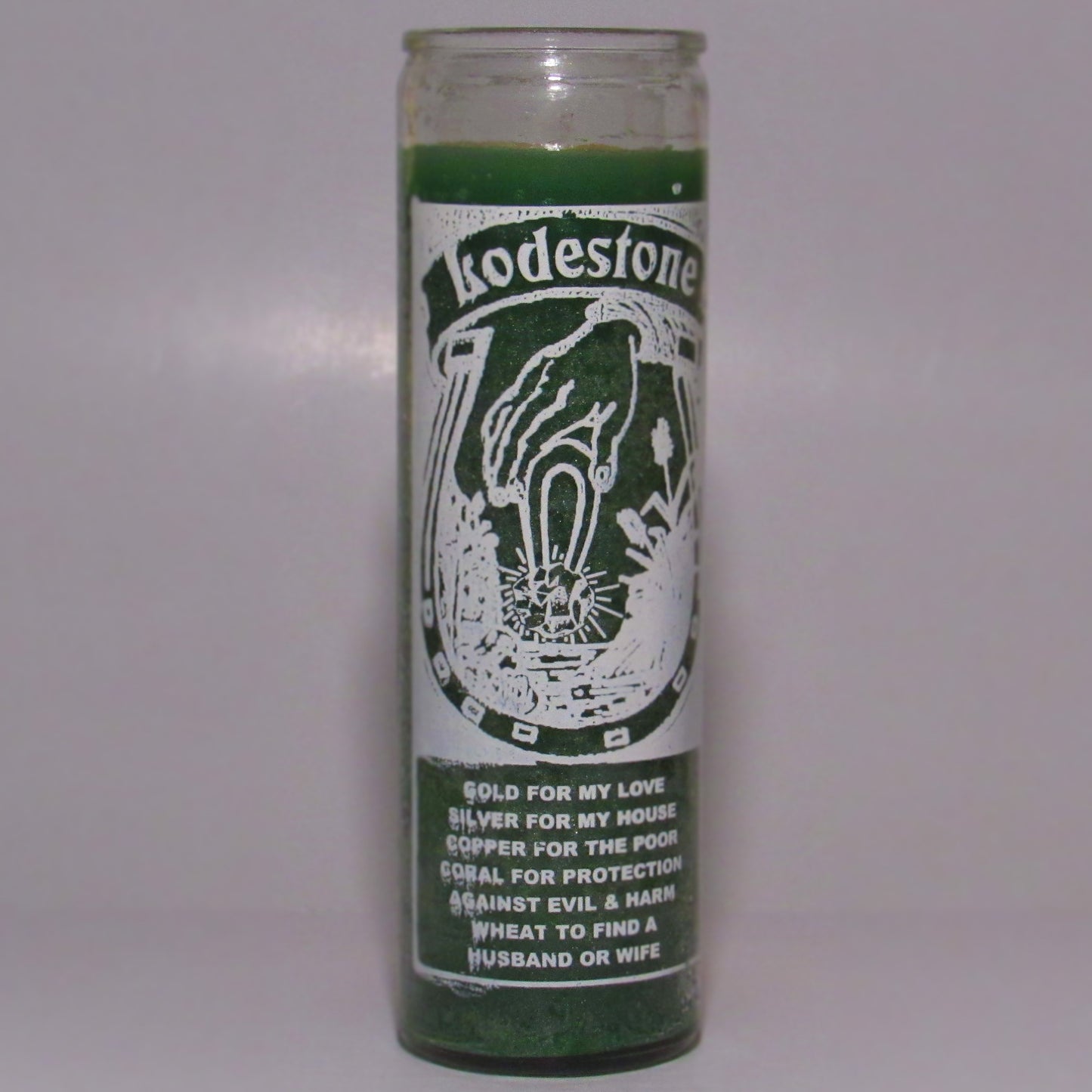 Green candle with text and imagery 