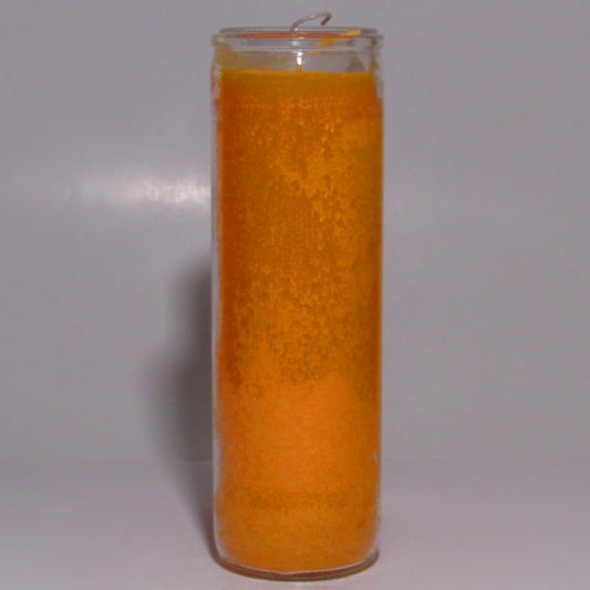 Orange candle in a glass jar on a white background