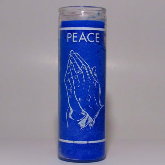 Blue candle with 'PEACE' and praying hands design 