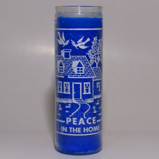 Blue candle with white designs and text 