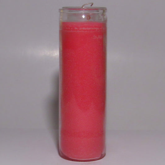 Pink candle in a clear glass holder 