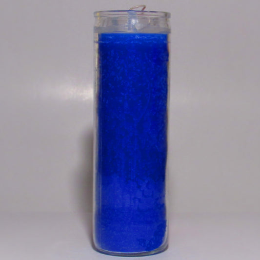 Blue candle in a clear glass jar 