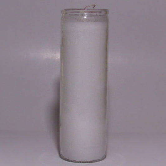 White candle in a glass holder 