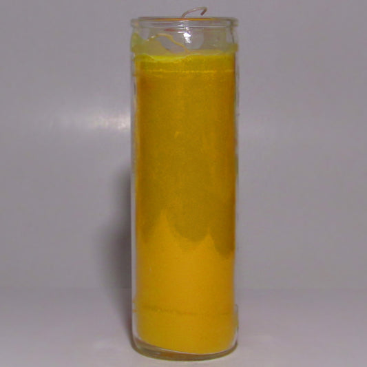 Yellow candle in a glass jar 