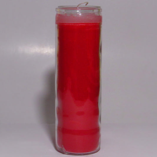 Red candle in a glass container 