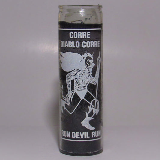 Cylindrical candle with black and white design and text 