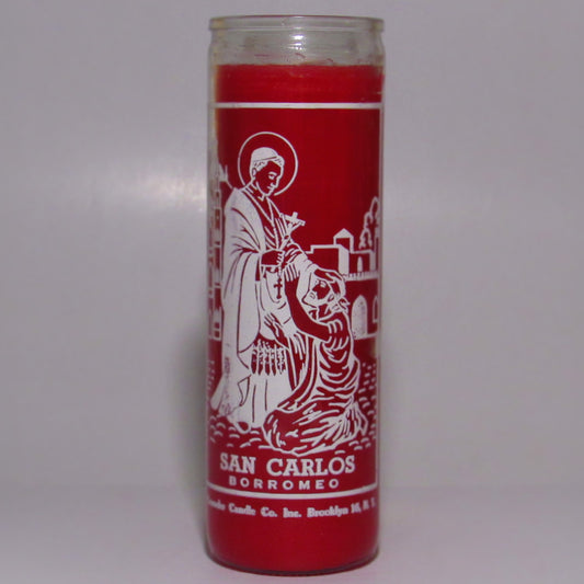 Red candle with white imagery and text 
